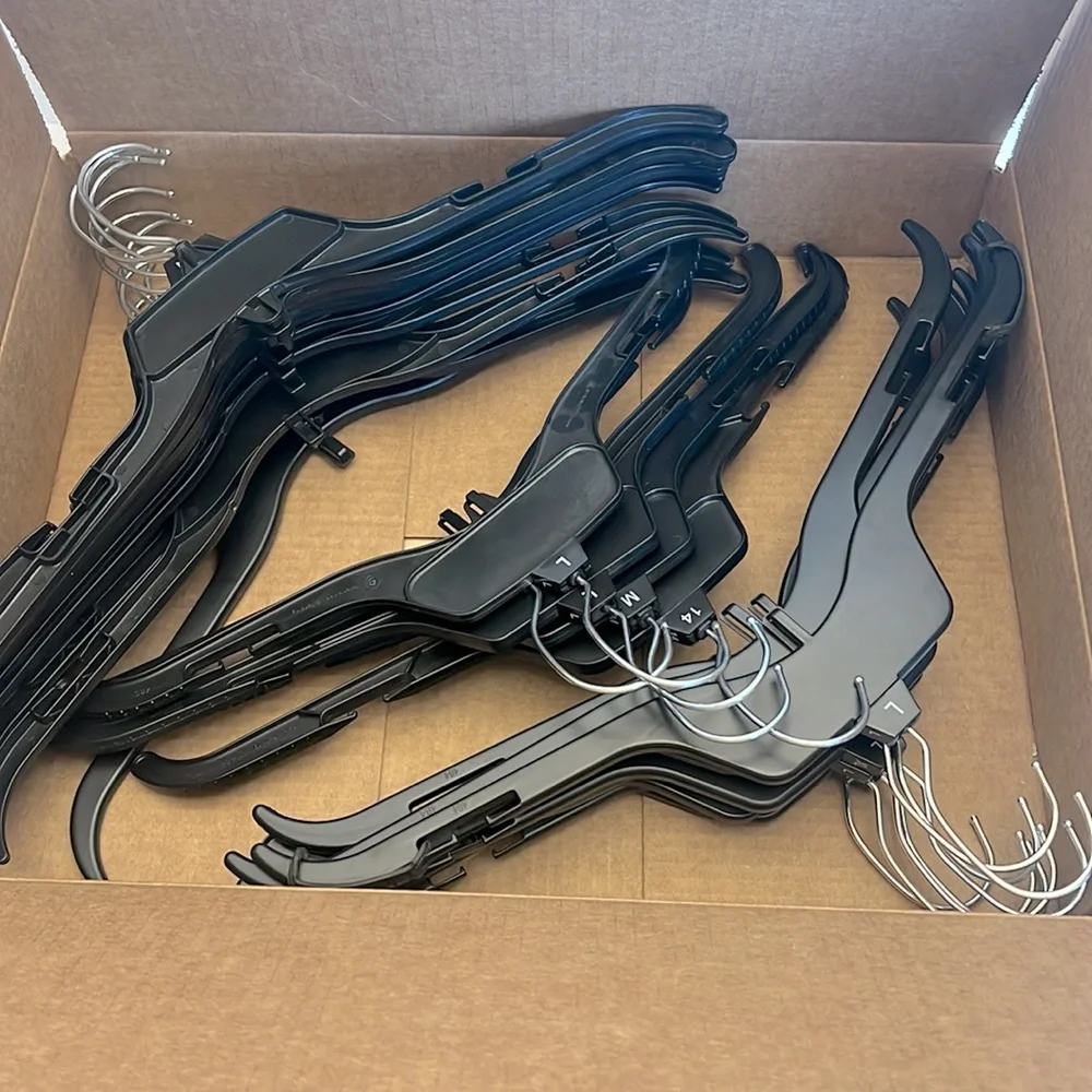 24 Black Retail Hangers with Silver Hook and All Can Add Another Hanger.